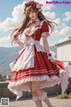 a woman in a red and white dress is posing for a picture