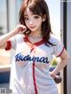 A woman in a baseball uniform posing for a picture.